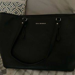 Handbag with three dividing compartments